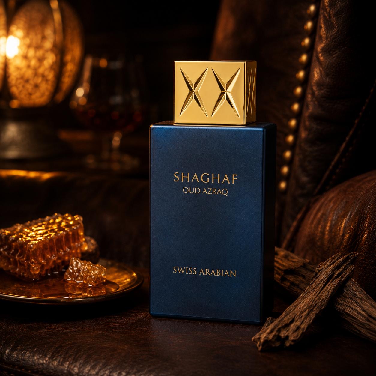 Shaghaf Oud Azraq by Swiss Arabian perfume bottle styled with honeycomb in a rich, dark oud setting