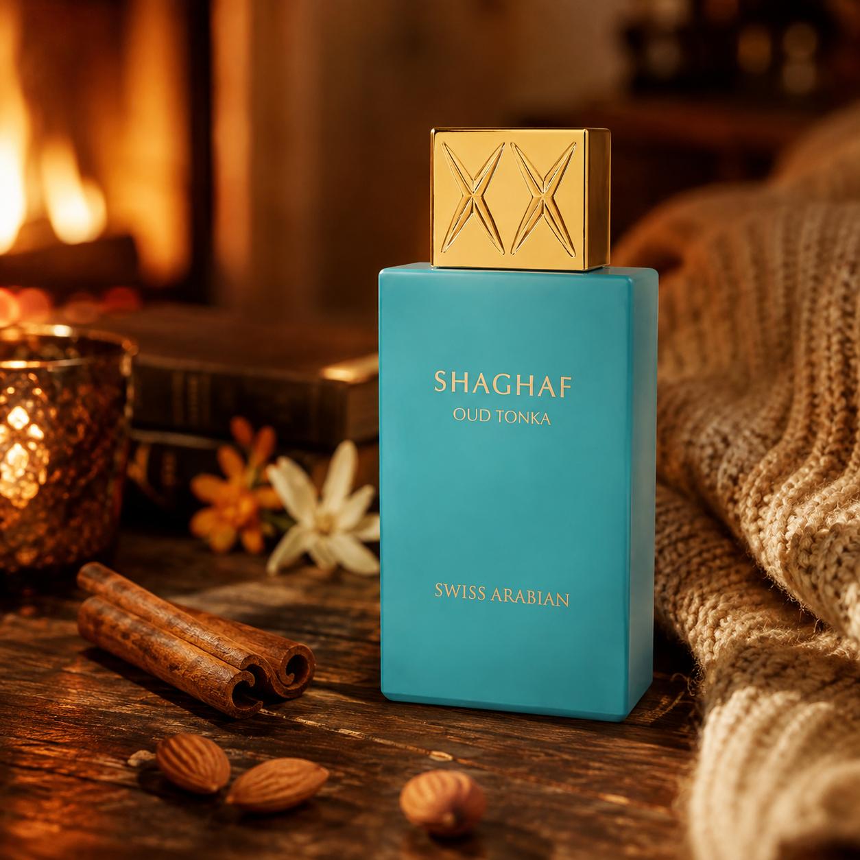 Shaghaf Oud Tonka by Swiss Arabian perfume bottle styled with almond and cinnamon in a warm winter setting